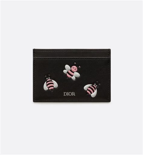 dior kaws bee card holder|DIOR x KAWS Black Card Holder with Pink Bees.